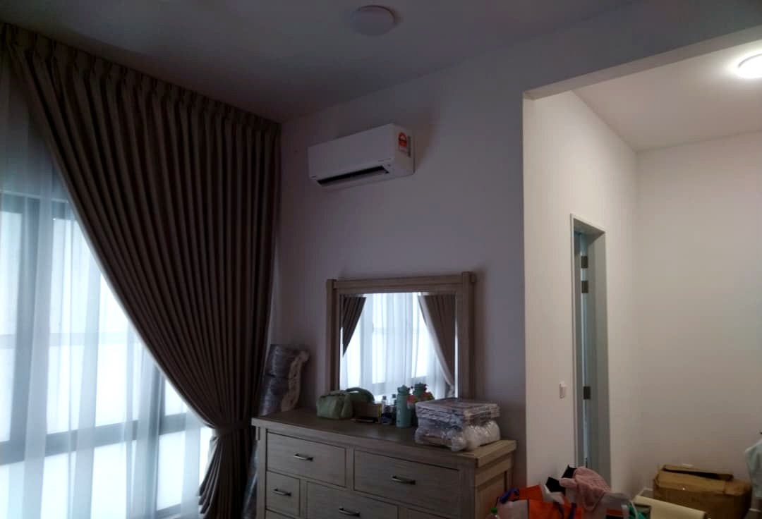 Daikin indoor air-conditioning unit installed near doorway